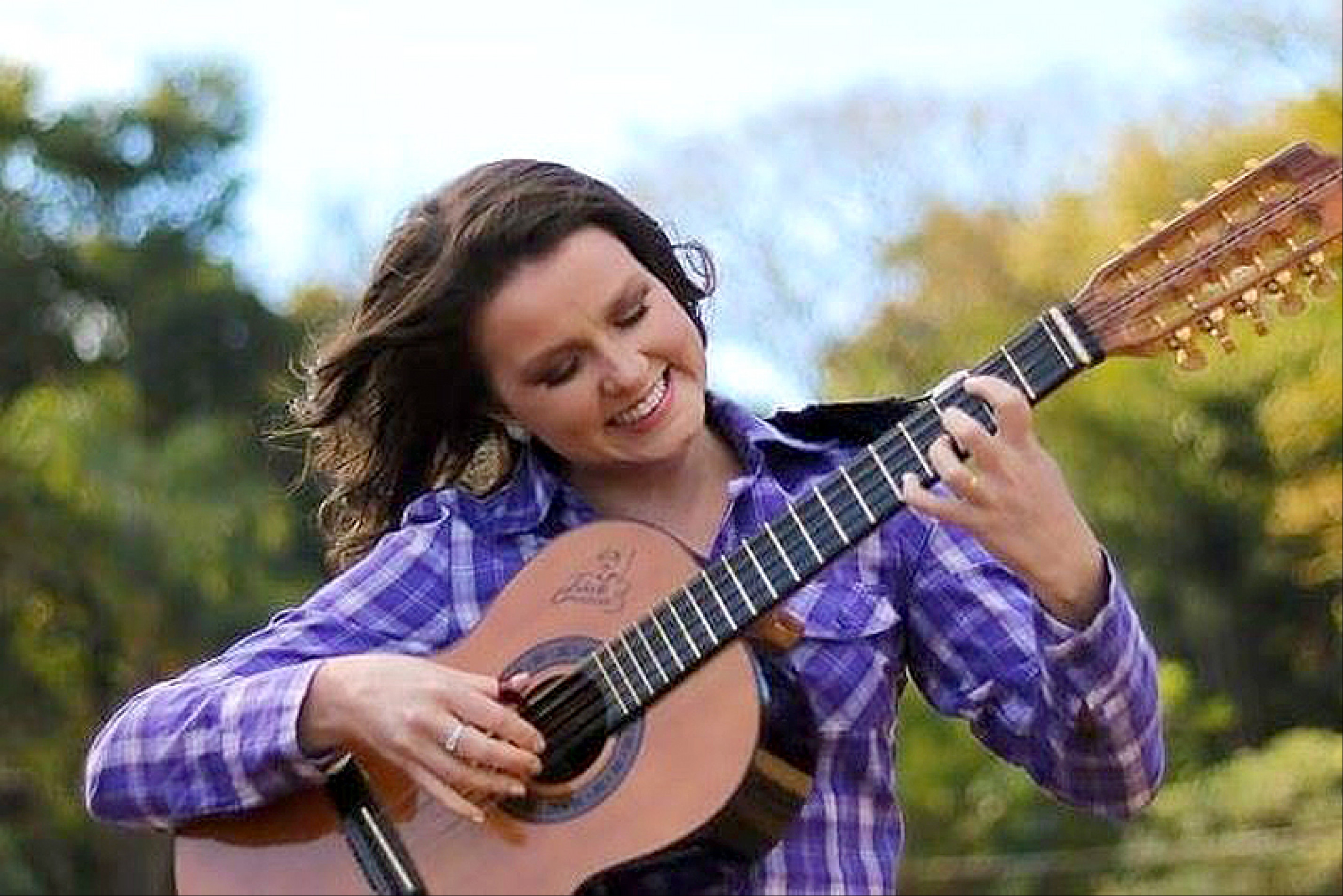 Karoline é cantora, violeira, compositora,
catireira, educadora musical e maestra